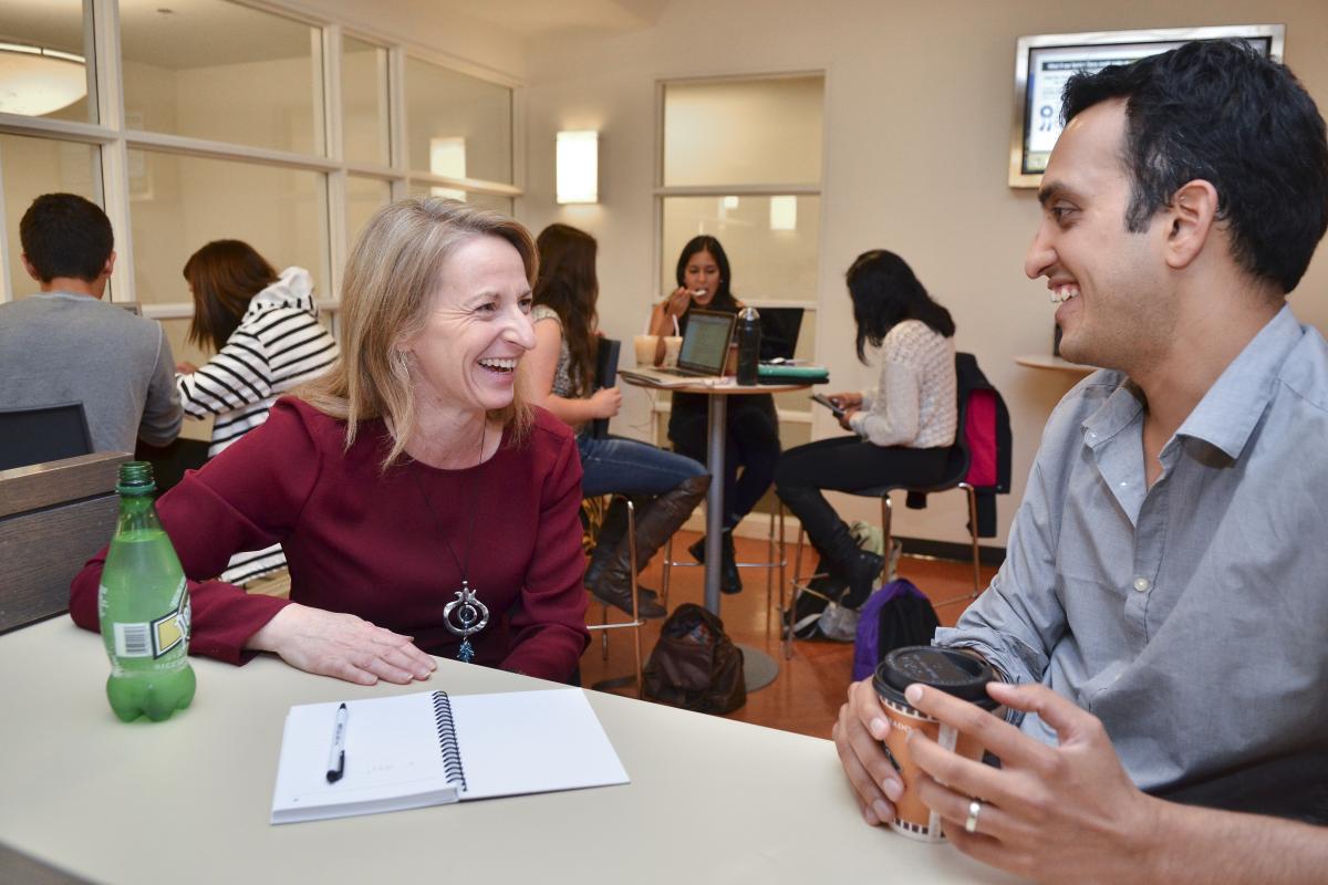 Sharon Matusik working with a student