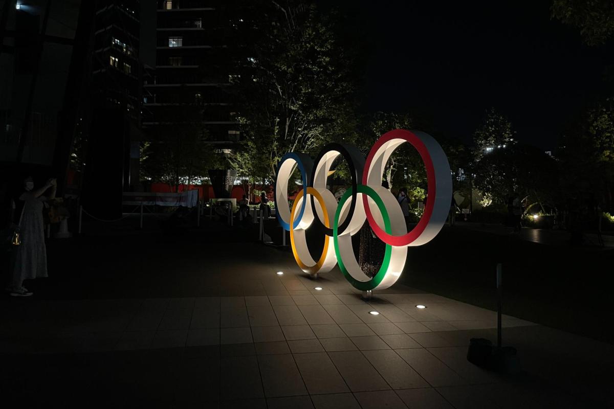 Olympic rings lit up at night