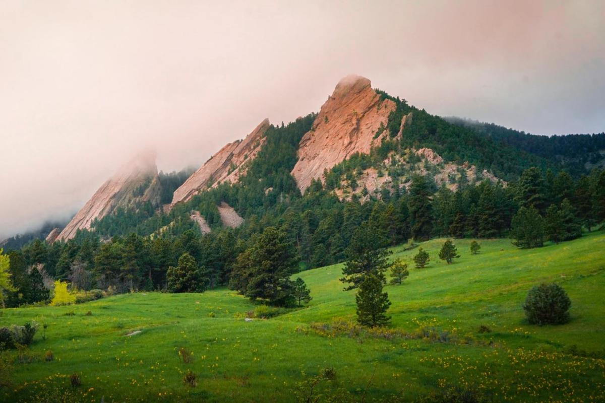 A misty spring view of the Flatirons.