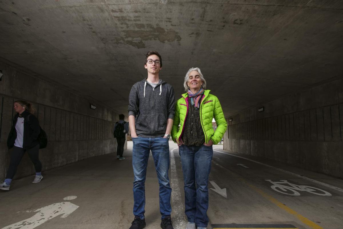 Instructor Martha Russo and student Sam Jones pose for a photo in the Regent underpass