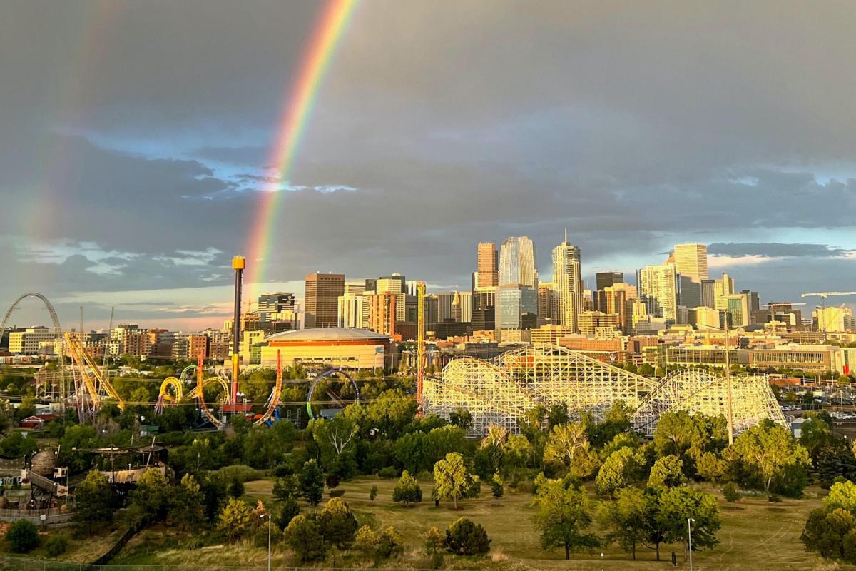 A double rainbow appears over Elitch Gardens in Denver. (Photo by Steph Wilson on Unsplash)
