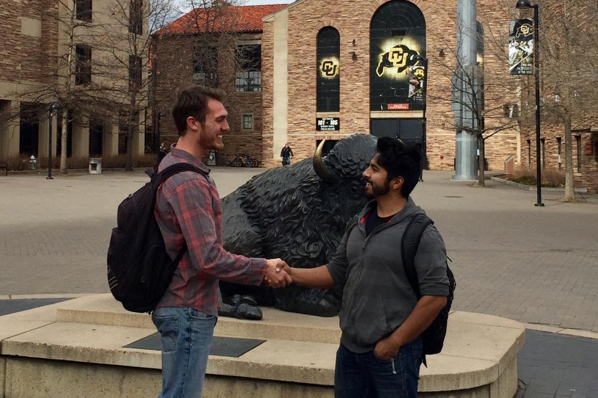 Student veterans shaking hands