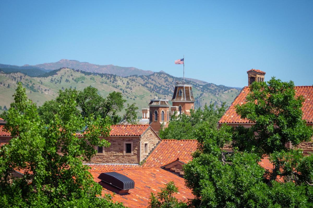 Old Main through the mountains