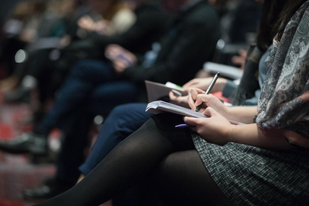 journalists taking notes