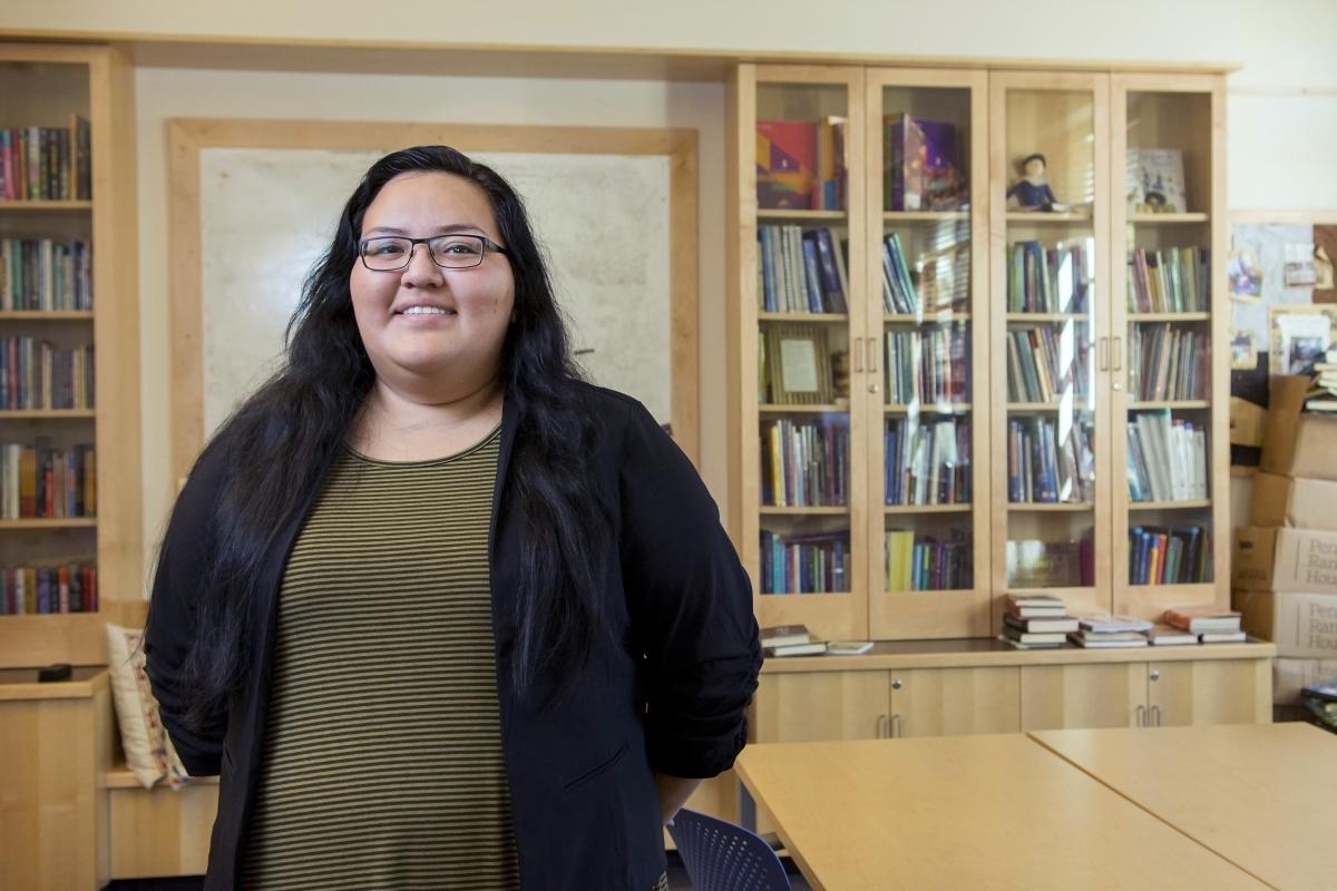 Zuri Juarez-Delgado poses in a classroom on the CU Boulder campus