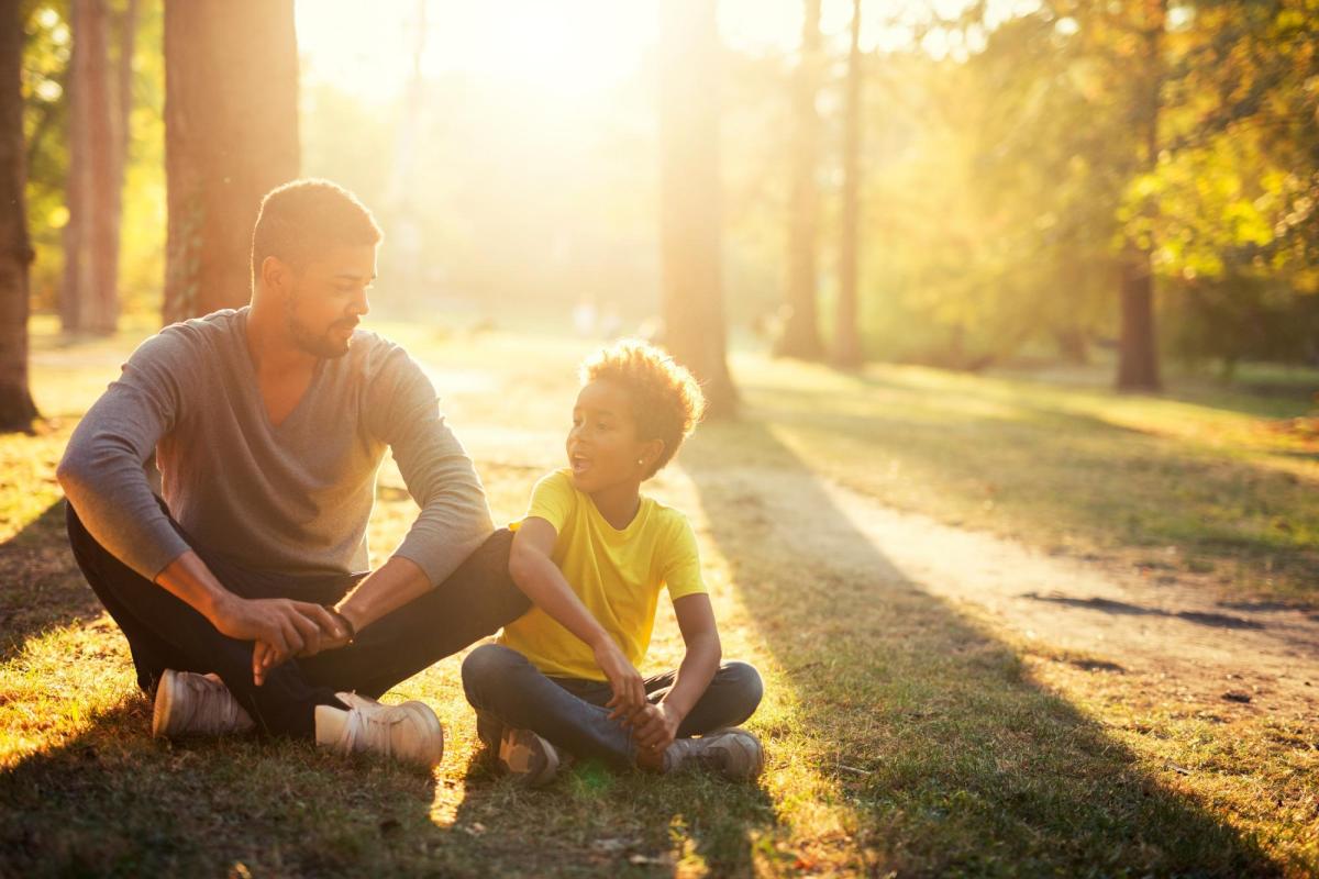 father talking to his child