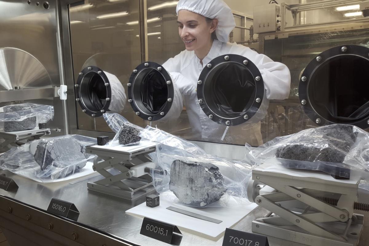 Geologist Carolyn Crow inspecting moon rocks at NASA's Johnson Space Center in Houston.