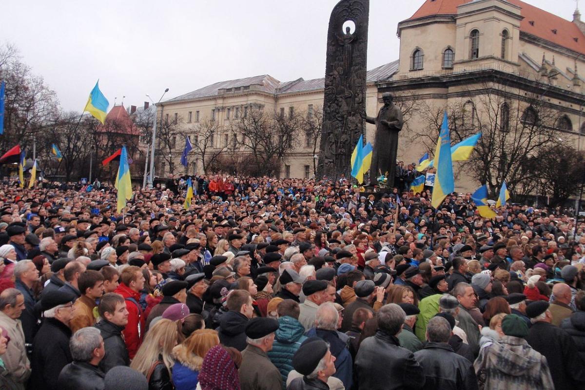Protestors waving European Union flags