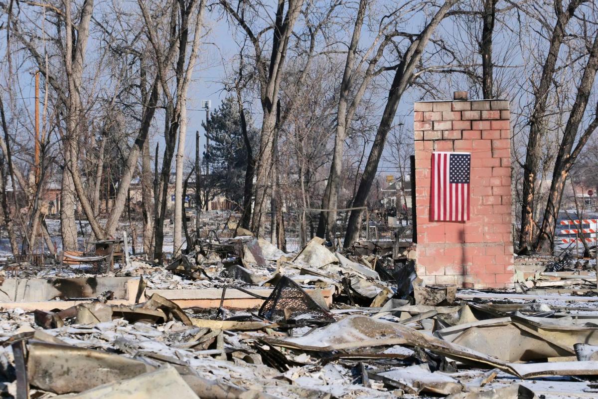 Home burned in the Marshall Fire with American fllag