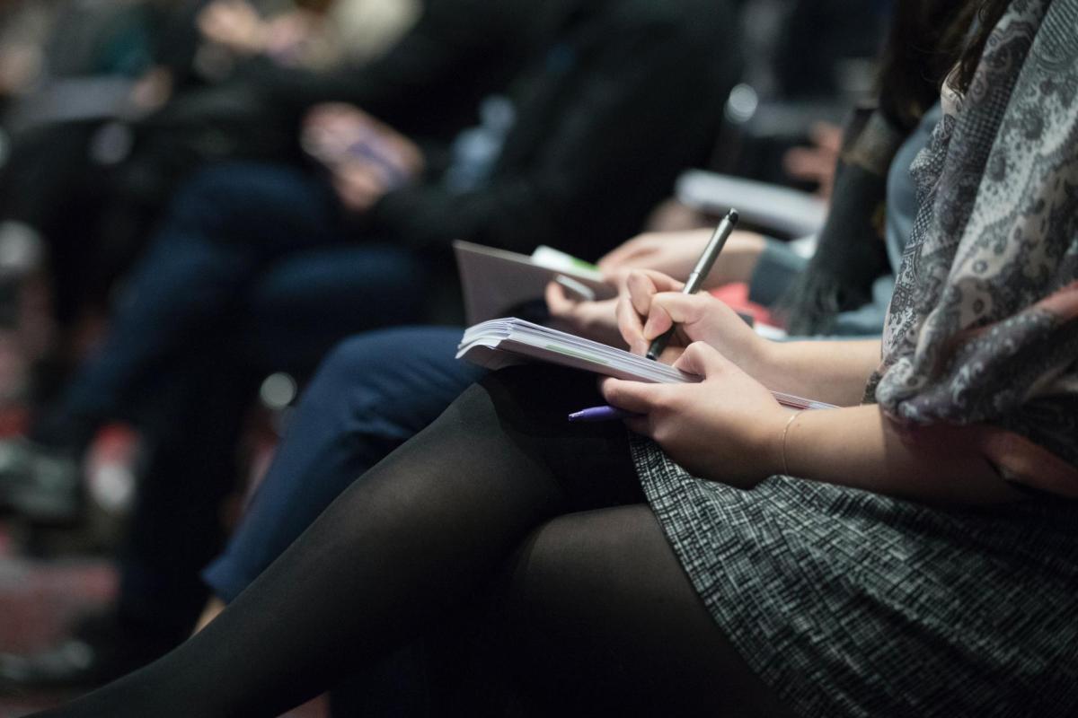 journalists taking notes