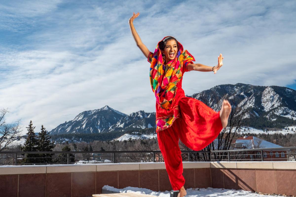 Serene Singh performs Bhangra dance on the deck of the CASE building