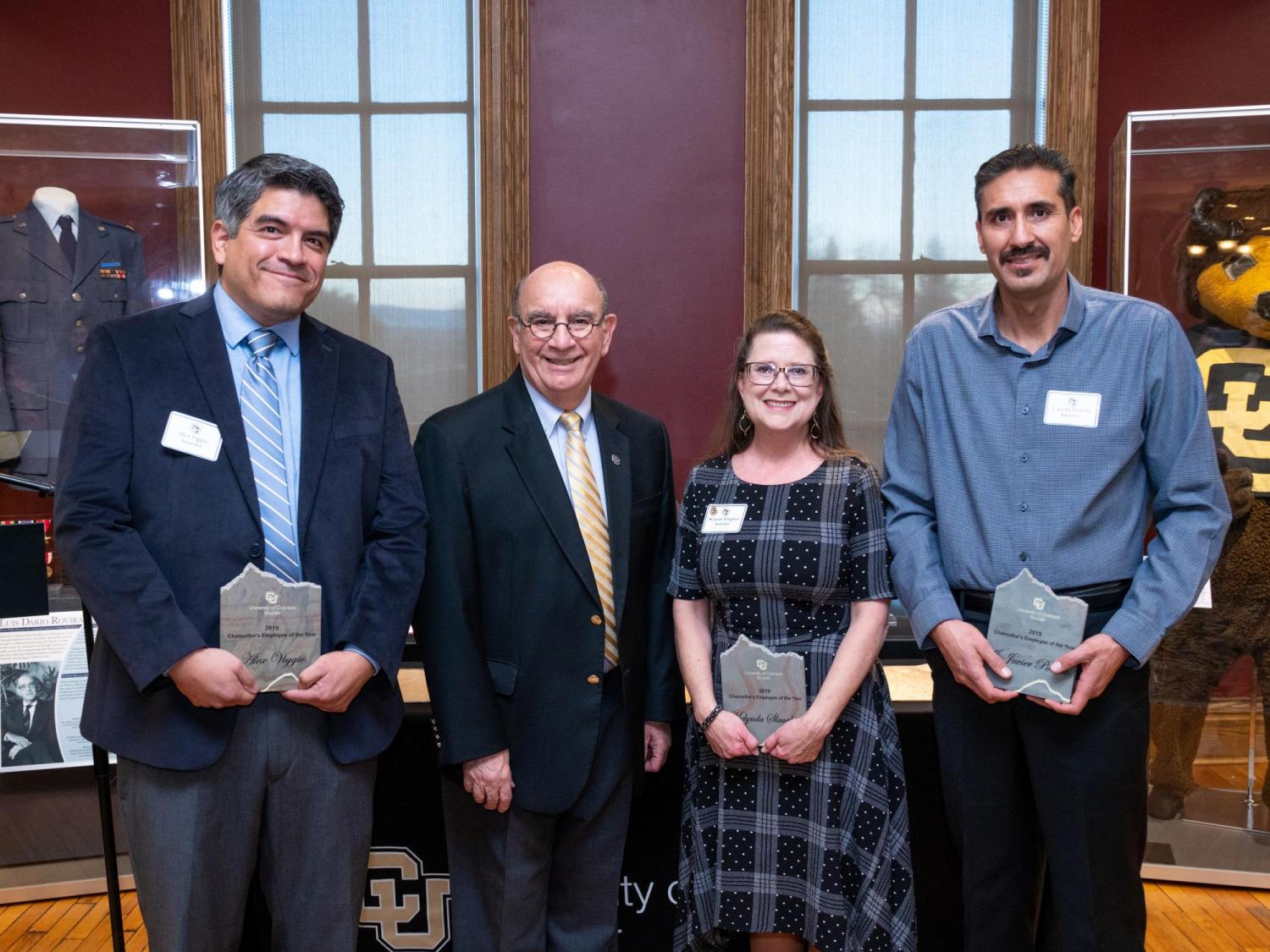 Four recipients, pictured with the chancellor, are the recipients of the Empolyee of the Year Award for 2019