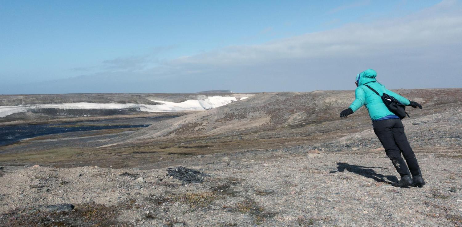 Sarah Crump on a windy day in the Arctic