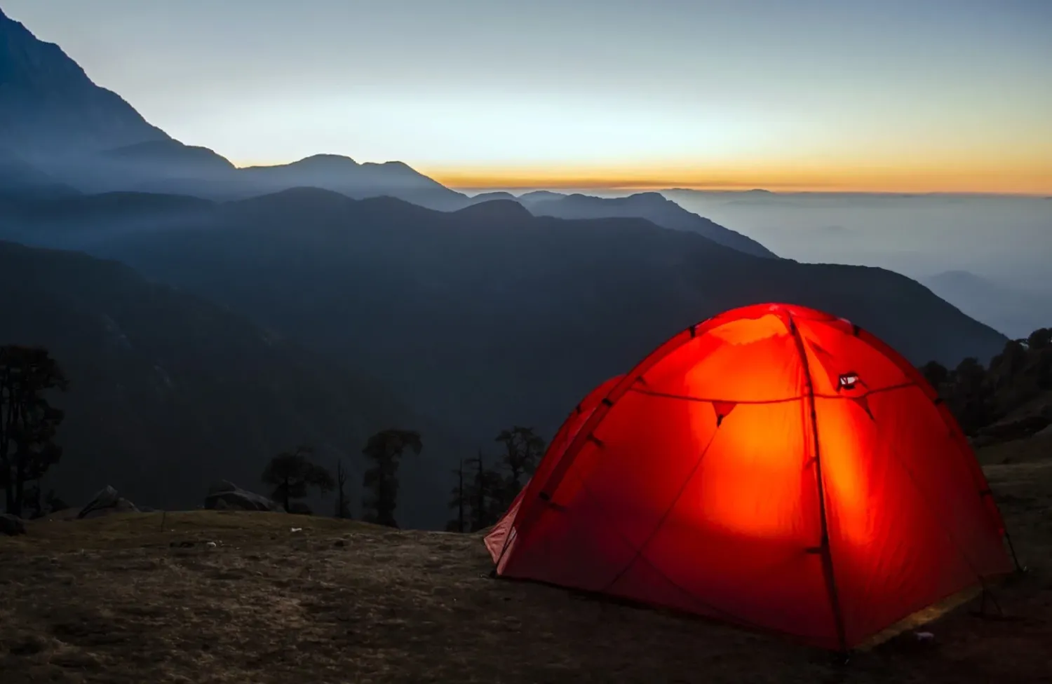 Camping tent at sunset