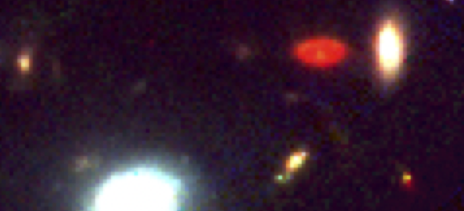 Several colorful blotches set against the blackness of space
