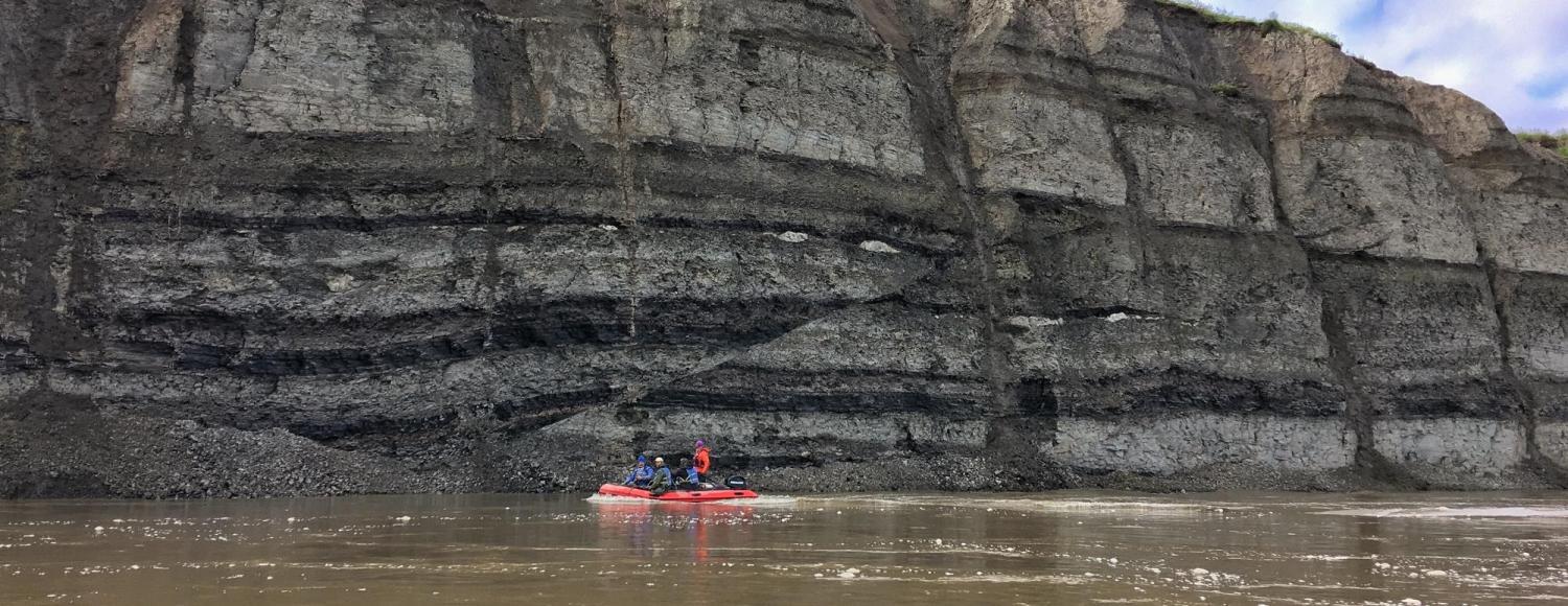 Researchers row down the Colville River