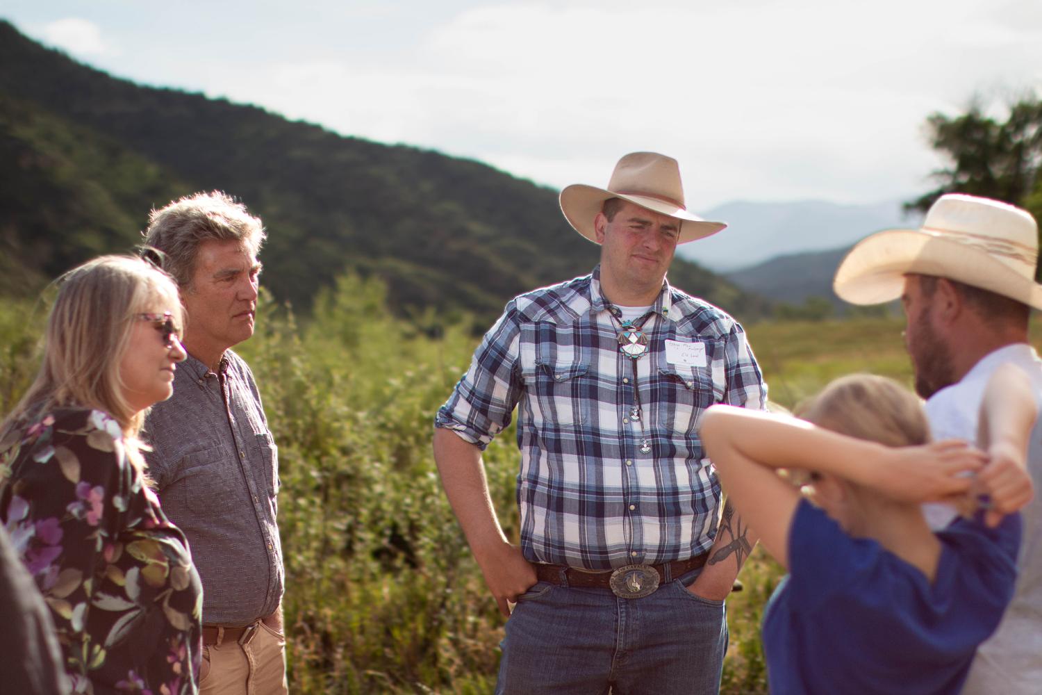 faculty members visit a multigenerational acequia outside Trinidad