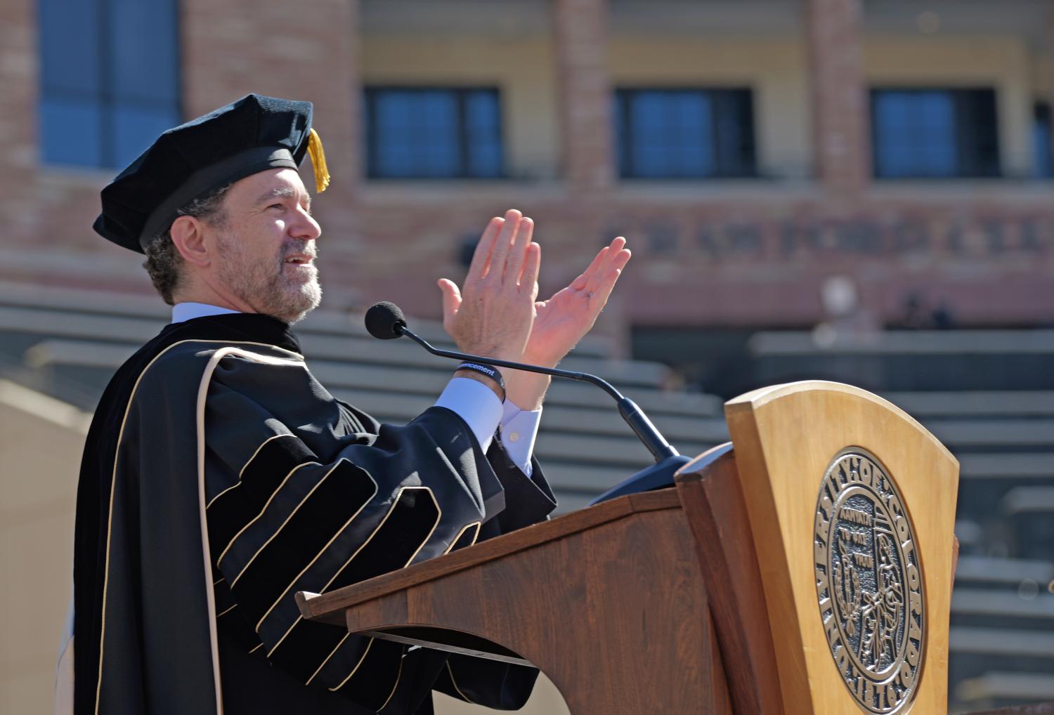 CU President Todd Saliman speaks at the podium