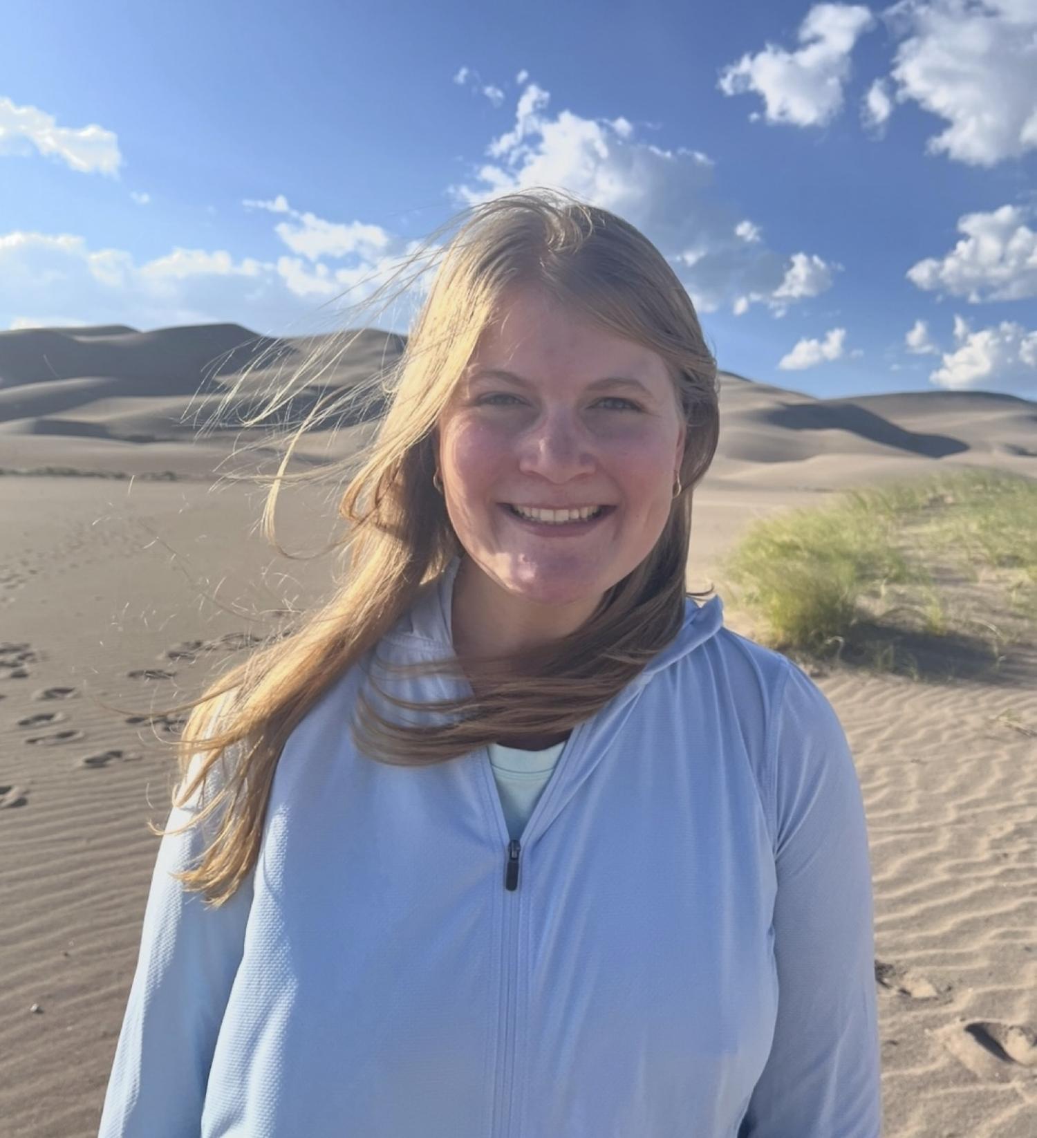 Stephanie McNamara with dunes in the background