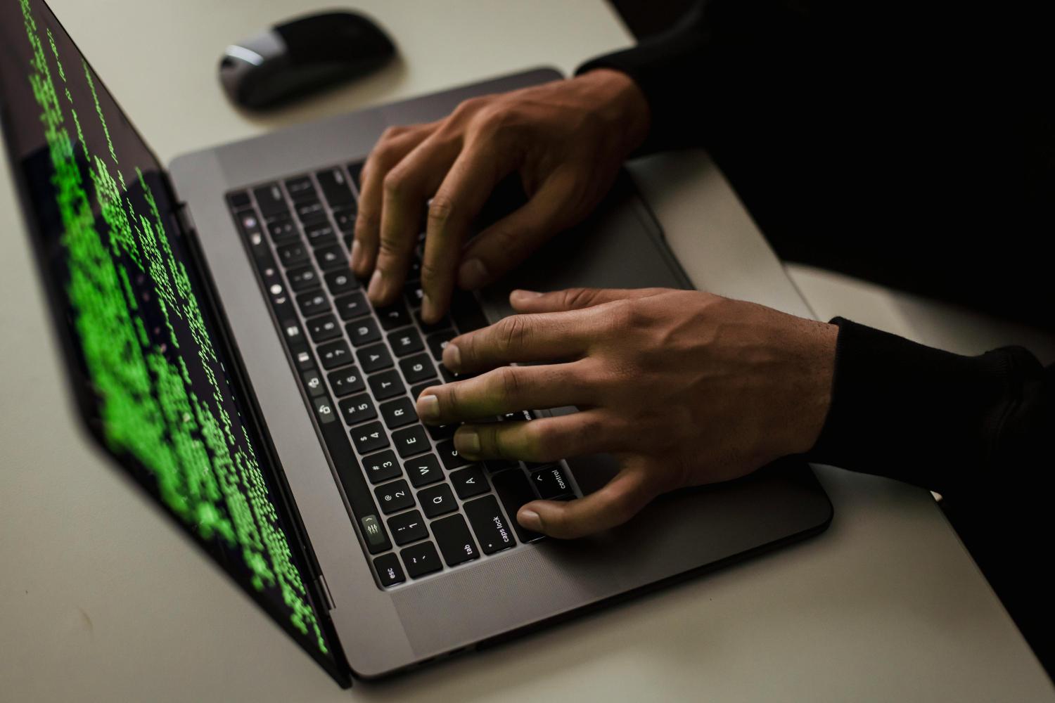Typing on a laptop computer