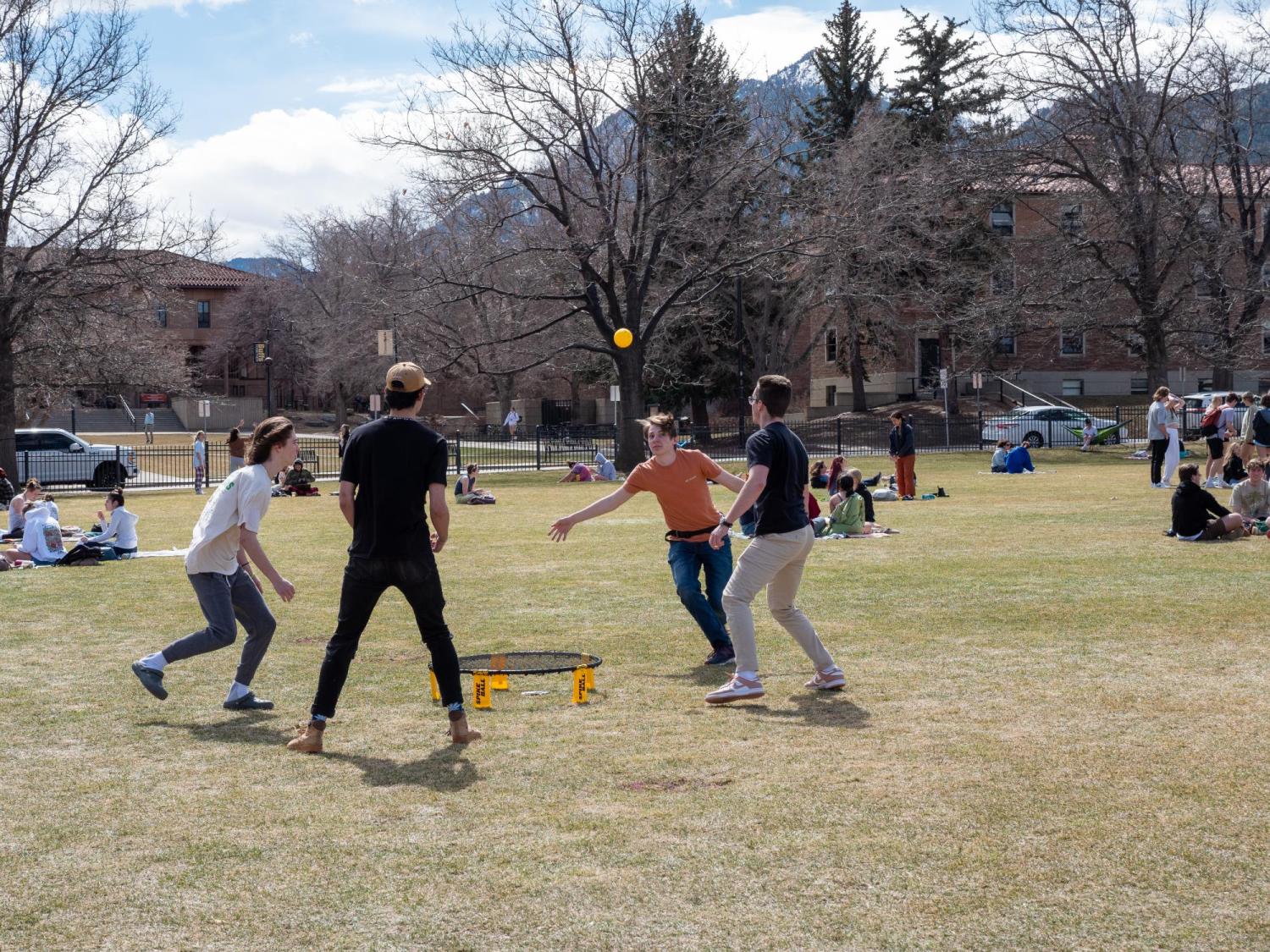 Students playing a lawn game on Norlin Quad
