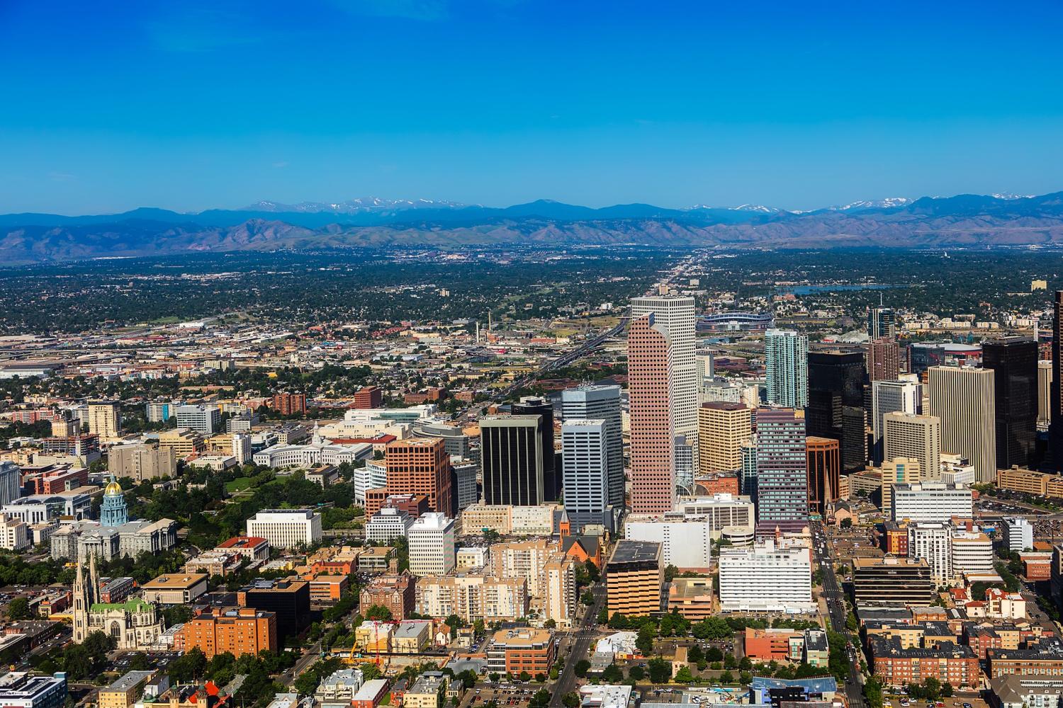 Denver skyline with Rocky Mountains in the background