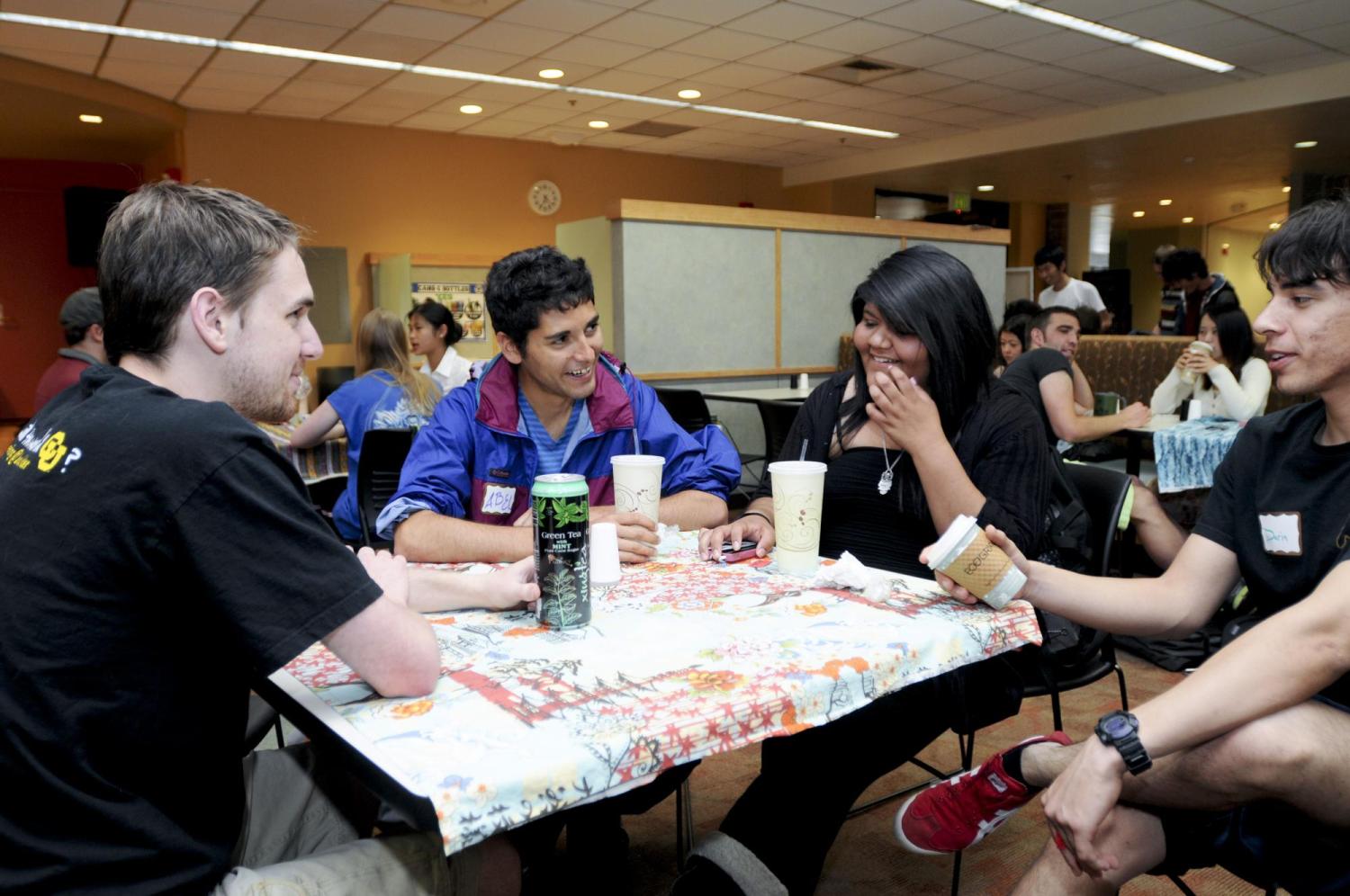 Students chat at International Coffee Hour