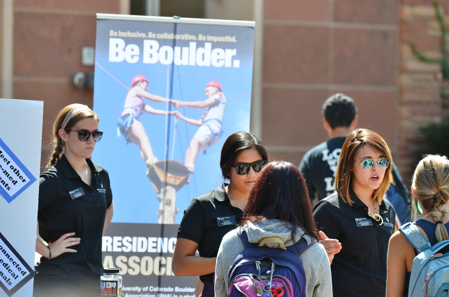 Photo of students at the fall Be Involved Fair at the UMC fountain.