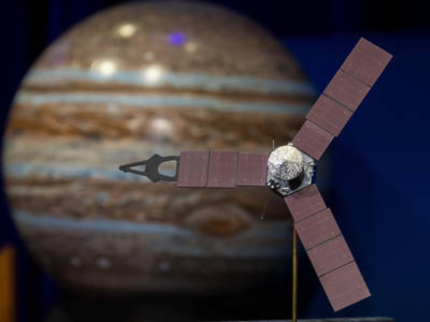 Artist rendition of JUNO Spacecraft orbiting Jupiter. Courtesy: NASA