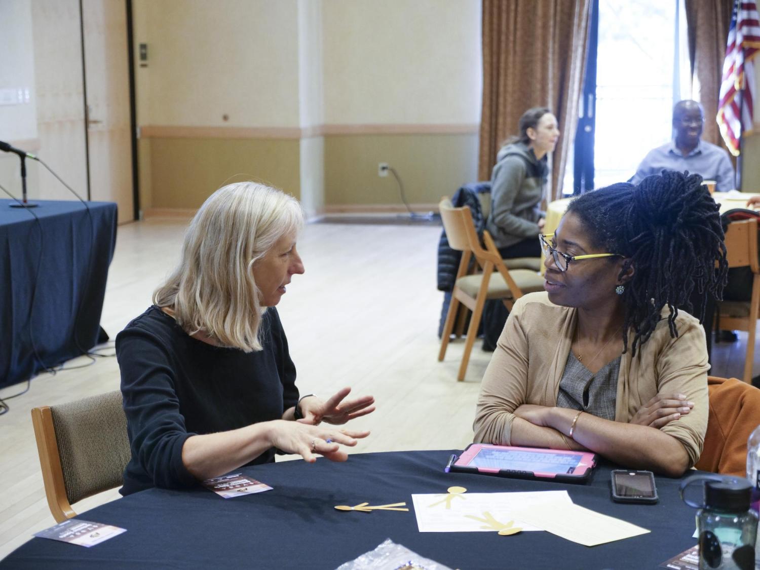 CU community members engage in a discussion