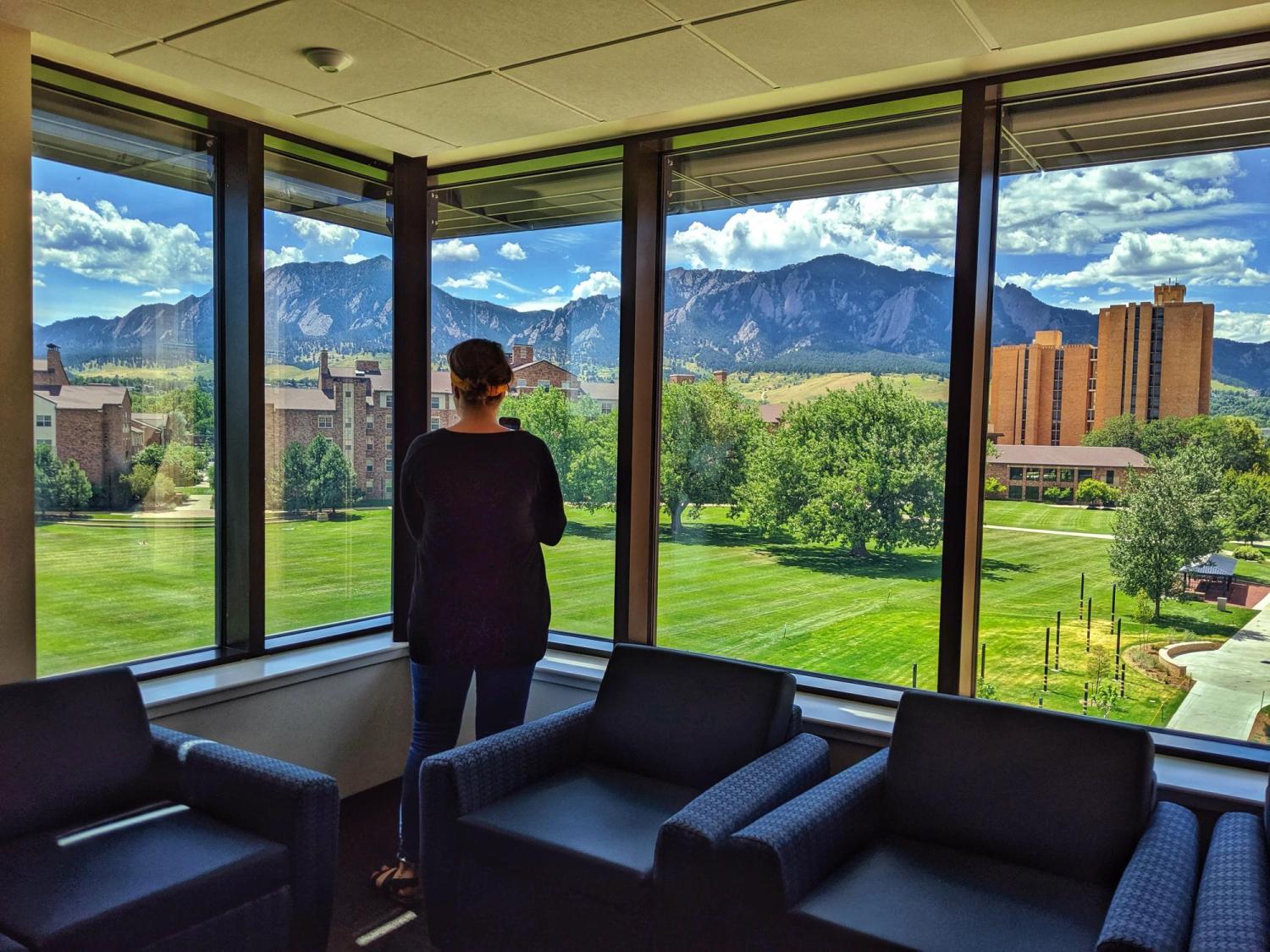 A view from Williams Village East of the Flatirons