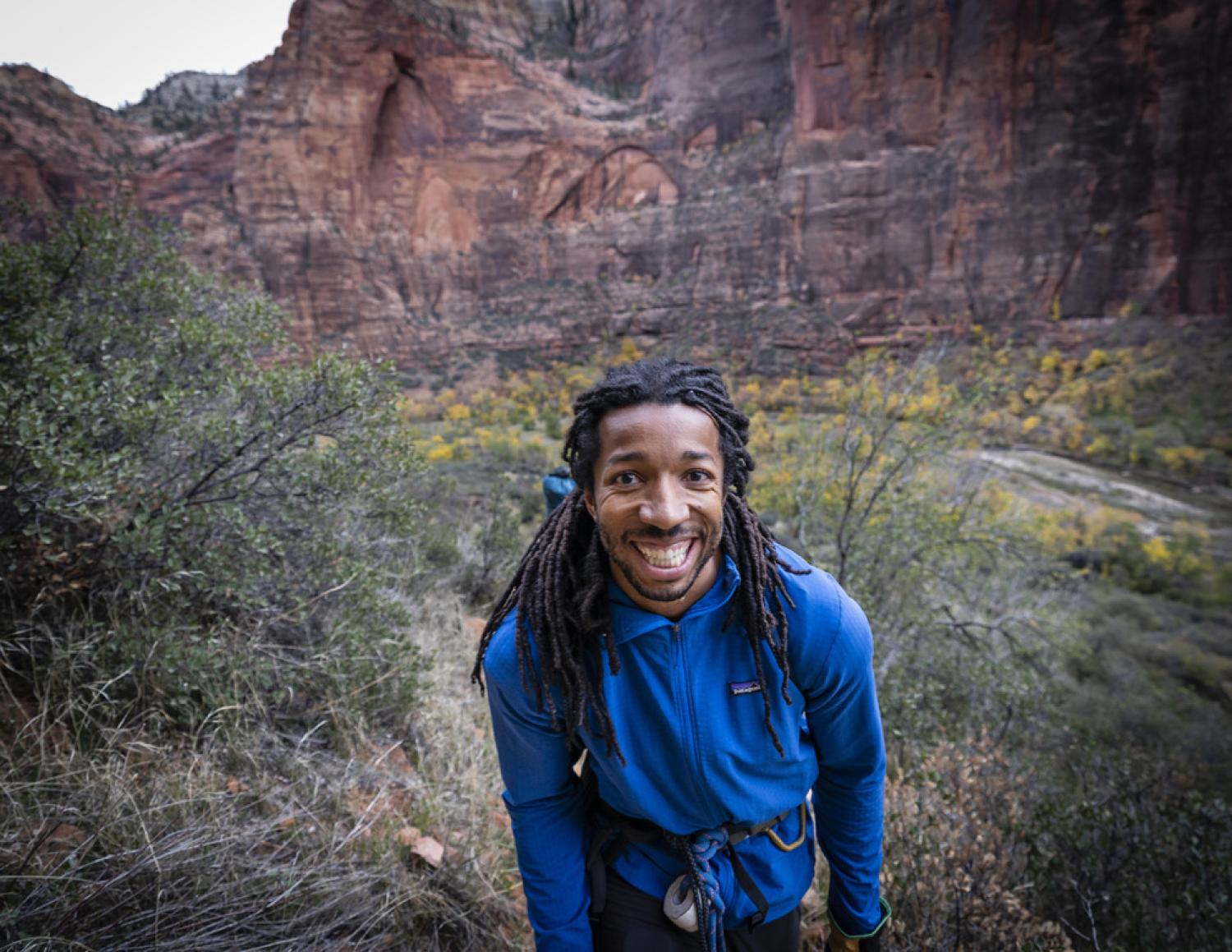 Eddie Taylor smiling while on a hike