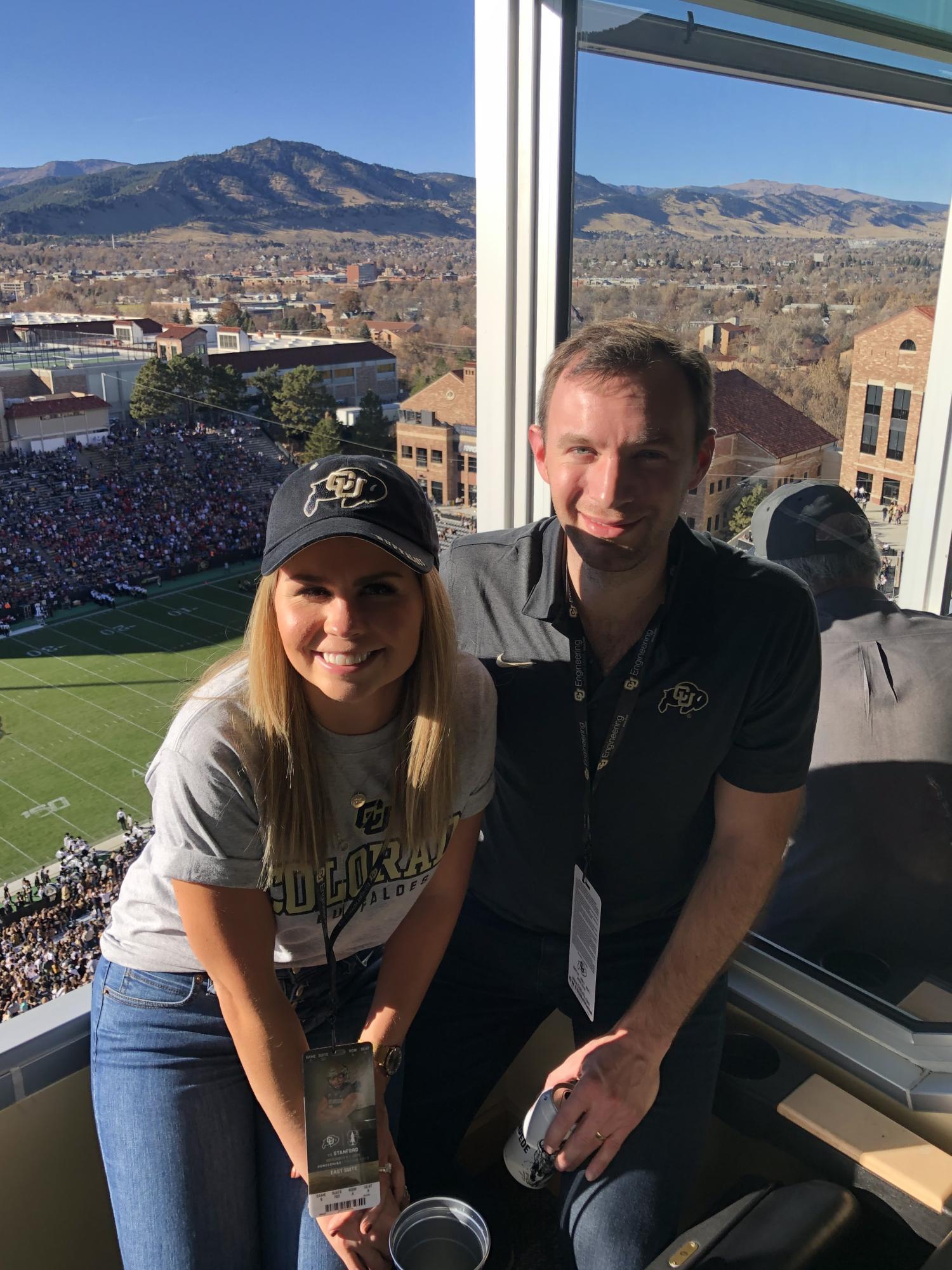 Brock Kowalchuk and his wife at a Buffs football game