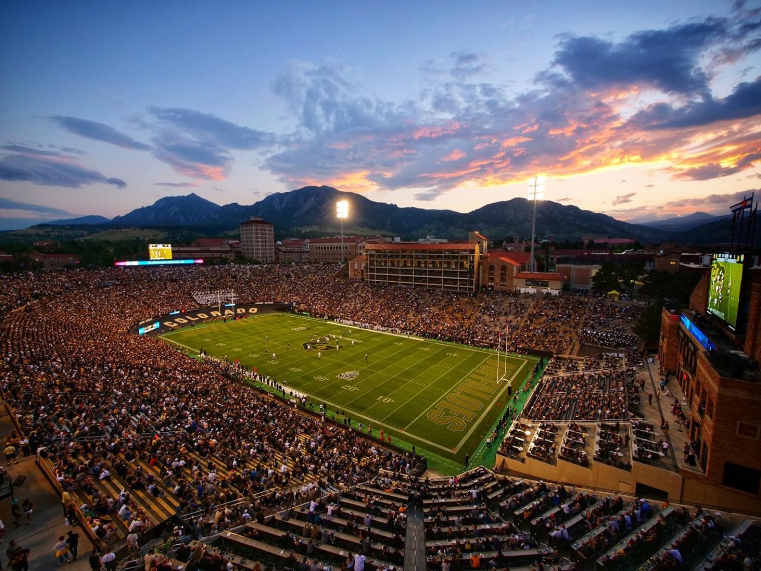 Sunset over Folsom Field during a game