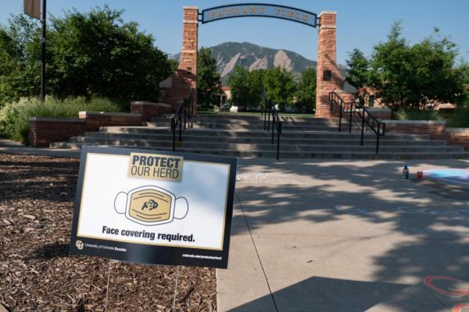 A Protect Our Herd sign at Farrand Field