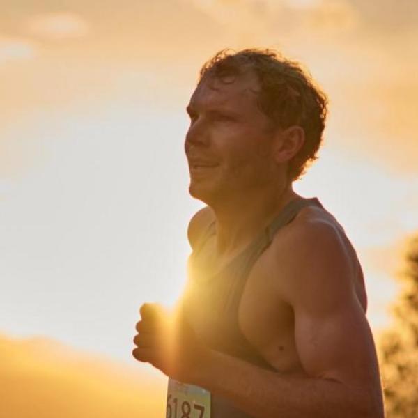 Jake Riley running at sunset