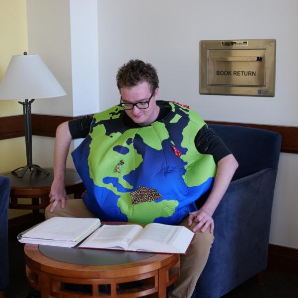 Timothy Scarbrough dressed as a court case—International Shoe Co. vs State of Washington—for Halloween this year. (Photo by Glenn Asakawa/University of Colorado)