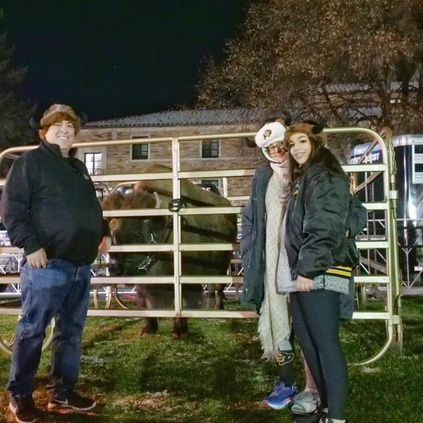 People take photos with the retiring Ralphie V ahead of Colorado's game against Washington on Saturday, Nov. 23, 2019. (Photo by Glenn Asakawa/University of Colorado)