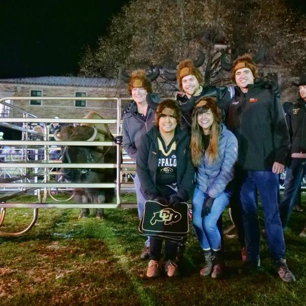 People take photos with the retiring Ralphie V ahead of Colorado's game against Washington on Saturday, Nov. 23, 2019. (Photo by Glenn Asakawa/University of Colorado)