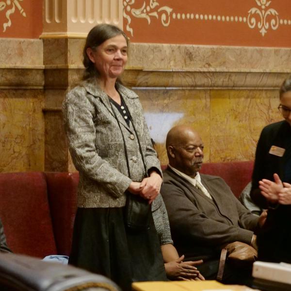 CU Boulder professor and state historian Patty Limerick is recognized by state Senator Rhonda Fields after she provided a tribute of Lucille Buchanan.