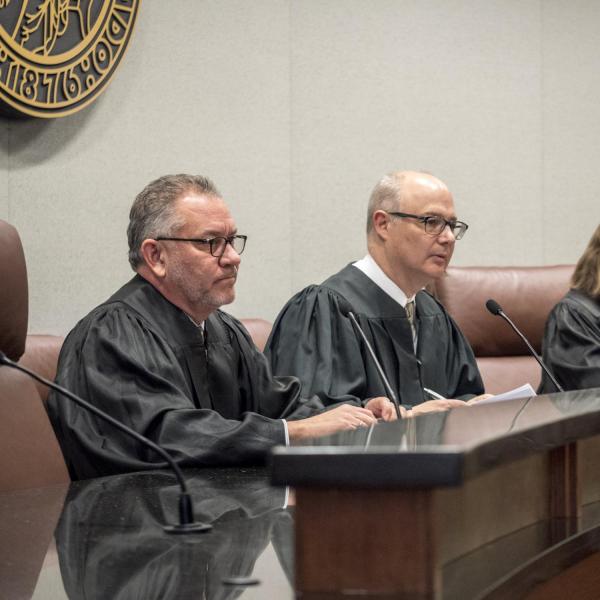 An esteemed panel of judges form the panel for the final round of the high school Moot Court competition at Colorado Law. Photo by Glenn Asakawa.