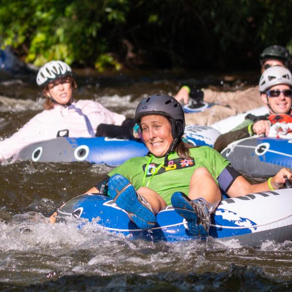 Brave tubers float down Boulder Creek for the 2019 Tube to Work Day.