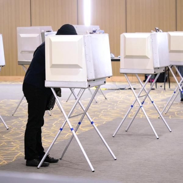 Students cast their ballots at a polling place in the Williams Village Center at CU Boulder. (Photo by Glenn Asakawa/University of Colorado)