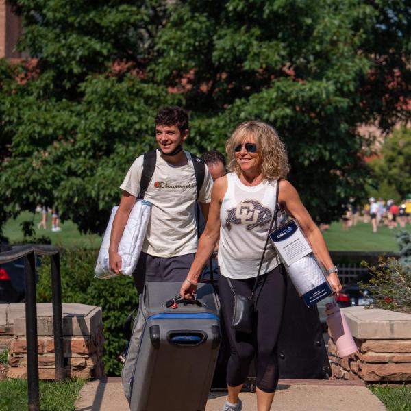 First-year students, parents, staff and volunteers welcome each other back to CU Boulder on Monday, Aug. 16, 2021. (Photo by Patrick Campbell/University of Colorado)