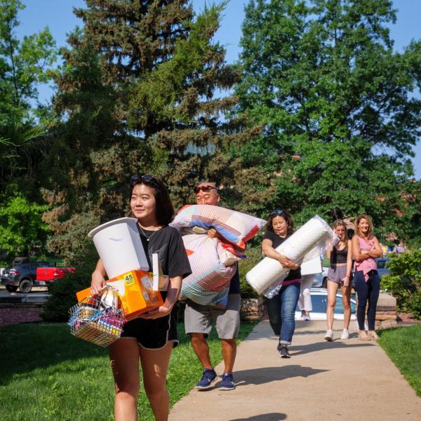 First-year students, parents, staff and volunteers welcome each other back to CU Boulder on Monday, Aug. 16, 2021. (Photo by Patrick Campbell/University of Colorado)