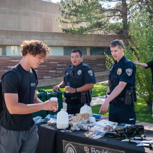 Students meet with CUPD officers during the semester's first Coffee with a Cop event. (Photo by Patrick Campbell/University of Colorado)
