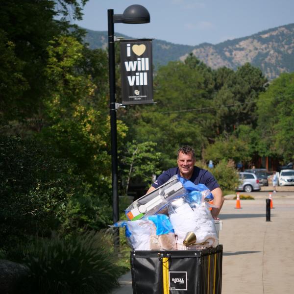 First-year students, parents, staff and volunteers welcome each other back on the CU Boulder campus in the Williams Village Complex on Monday, Aug.16, 2021. (Photo by Glenn Asakawa/University of Colorado)