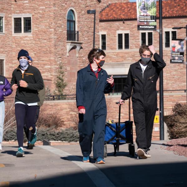 Students return to the Kittredge residence hall complex on Feb. 7, 2021, after studying remotely since the middle of January. (Photo by Glenn Asakawa/University of Colorado)