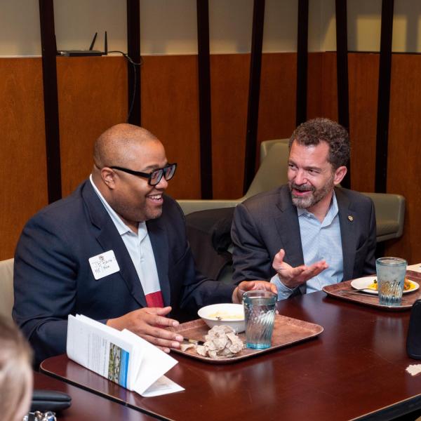 CU President Todd Saliman meets with students and Dean of Students JB Banks over lunch at the C4C.
