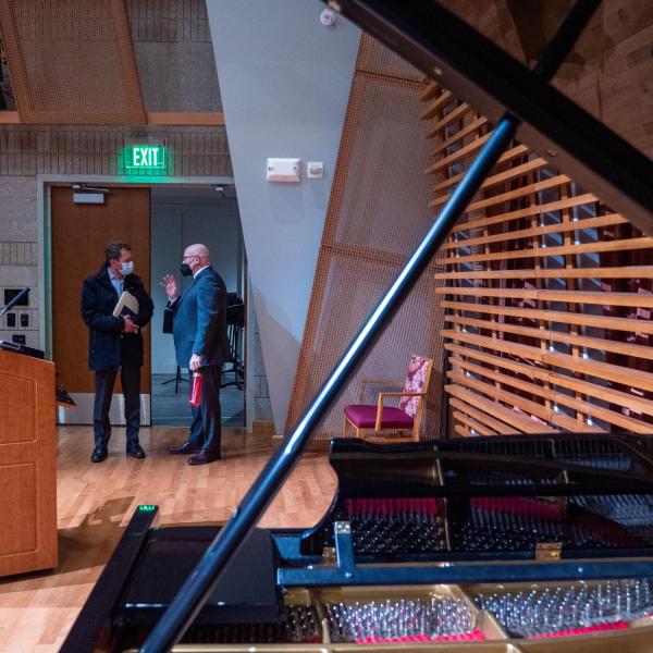 CU President Todd Saliman takes a tour of the new music building addition with Dean John Davis.